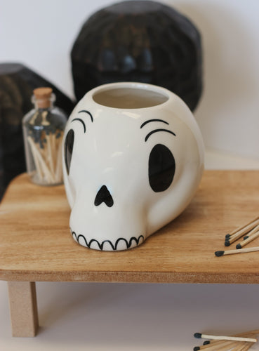 Black and white skull halloween candle